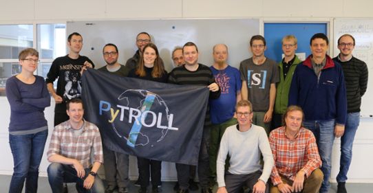 Group with flag at Pytroll tenth year annicersary