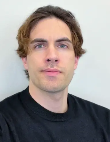 Porträtt på en man.