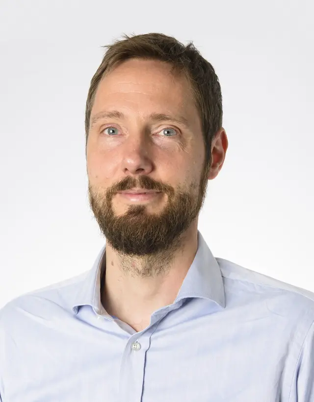 Porträtt bild av Tomas Gustafsson