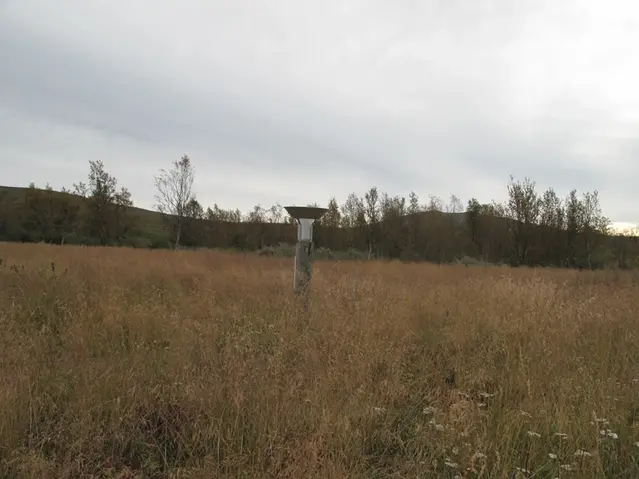 Saarikoski - SMHIs nordligaste väderstation. I bakgrunden syns Finland.