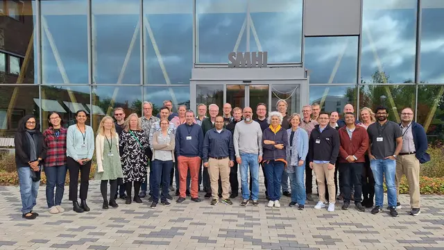Group photo of the researchers at the SMHI meteorological research unit a sunny day. 